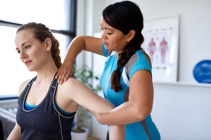 woman shoulder stretch backwards